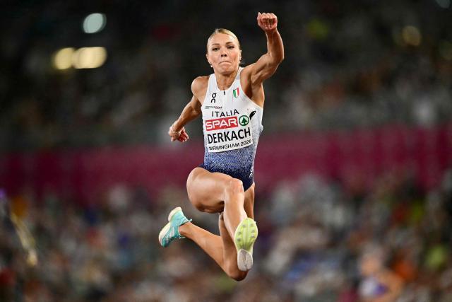 Italy's Dariya Derkach competes in the women's triple jump final during the European Athletics Championships at Alexander Stadium in Birmingham on August 13, 2026. (Photo by Ben STANSALL / AFP)