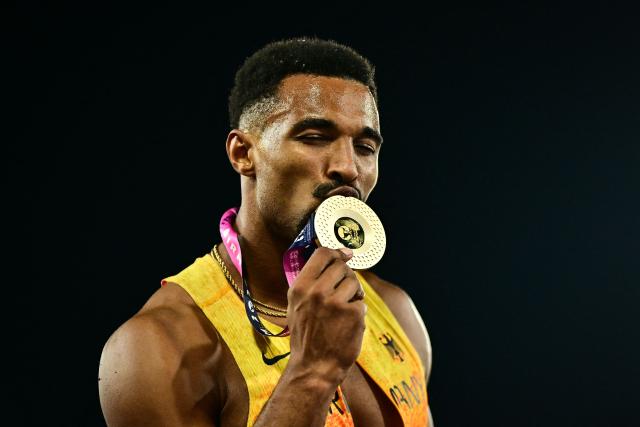 Gold medallist Germany's Leo Neugebauer celebrates after winning the overall decathlon event following the men's decathlon 1500m final during the European Athletics Championships at Alexander Stadium in Birmingham on August 13, 2026. (Photo by Ben STANSALL / AFP)