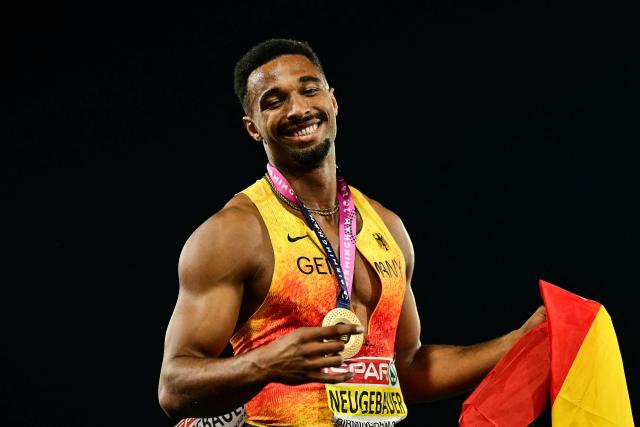 Gold medallist Germany's Leo Neugebauer celebrates after winning the overall decathlon event following the men's decathlon 1500m final during the European Athletics Championships at Alexander Stadium in Birmingham on August 13, 2026. (Photo by Ben STANSALL / AFP)