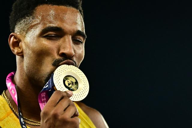 Gold medallist Germany's Leo Neugebauer celebrates after winning the overall decathlon event following the men's decathlon 1500m final during the European Athletics Championships at Alexander Stadium in Birmingham on August 13, 2026. (Photo by Ben STANSALL / AFP)