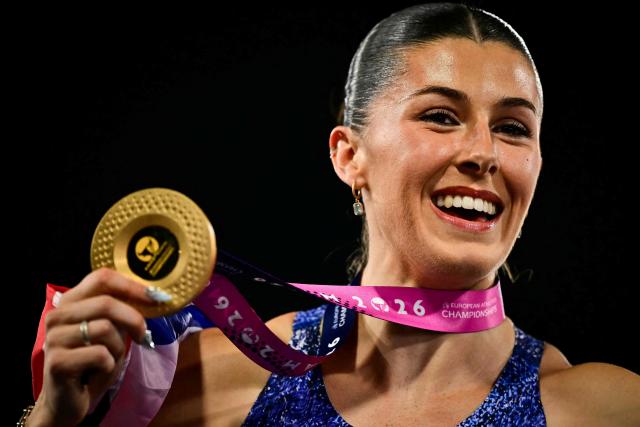 Gold medallist Britain's Amy Hunt celebrates after winning in the women's 200m final during the European Athletics Championships at Alexander Stadium in Birmingham on August 13, 2026. (Photo by Ben STANSALL / AFP)