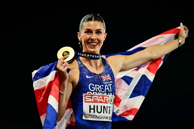 Gold medallist Britain's Amy Hunt celebrates after winning in the women's 200m final during the European Athletics Championships at Alexander Stadium in Birmingham on August 13, 2026. (Photo by Ben STANSALL / AFP)