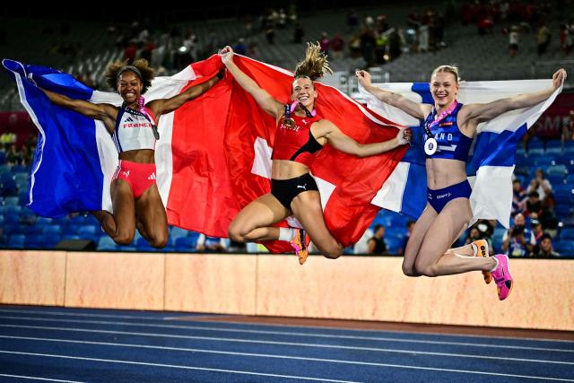 (From L) Bronze medallist France's Marie-Julie Bonnin, gold medallist Switzerland's Angelica Moser and silver medallist Finland's Wilma Heltela celebrate after competing in the women's pole vault final during the European Athletics Championships at Alexander Stadium in Birmingham on August 13, 2026. (Photo by Ben STANSALL / AFP)