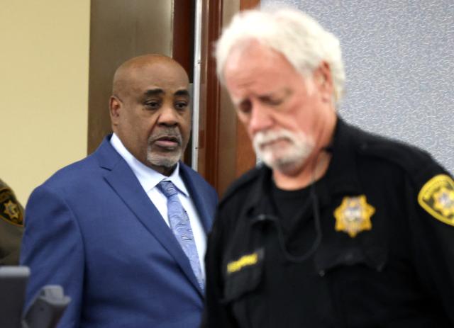 Duane Davis enters a courtroom during the fourth day of jury selection in his murder trial, related to the 1996 killing of rapper Tupac Shakur, at Clark County District Court Regional Justice Center in Las Vegas, Nevada, on August 13, 2026. The trial of the former gang leader accused of orchestrating the murder of rapper Tupac Shakur finally began on August 10, 30 years after one of America's most high-profile unresolved killings. The proceedings, expected to last a month, will likely not make clear who fired the shots that killed the California hip-hop legend on the night of September 7, 1996, while he was in Las Vegas to see a Mike Tyson boxing match. (Photo by Bizuayeha TESFAYE / POOL / AFP)