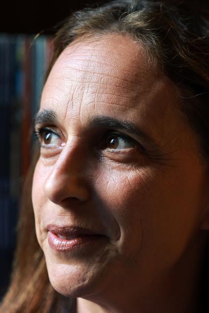 This photo taken on August 13, 2026 shows the Australia Director at Human Rights Watch, Daniela Gavshon, being interviewed by AFP in her office in Sydney. Five years since the Taliban returned to power in Afghanistan, Gavshon said “When the Taliban first took over, the loss of foreign assistance really accelerated the financial collapse and humanitarian catastrophe in Afghanistan. But since then, the withdrawal of foreign assistance from the US and the UK has really deepened and worsened the crisis”. (Photo by DAVID GRAY / AFP)