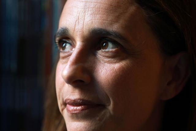 This photo taken on August 13, 2026 shows the Australia Director at Human Rights Watch, Daniela Gavshon, being interviewed by AFP in her office in Sydney. Five years since the Taliban returned to power in Afghanistan, Gavshon said “When the Taliban first took over, the loss of foreign assistance really accelerated the financial collapse and humanitarian catastrophe in Afghanistan. But since then, the withdrawal of foreign assistance from the US and the UK has really deepened and worsened the crisis”. (Photo by DAVID GRAY / AFP)