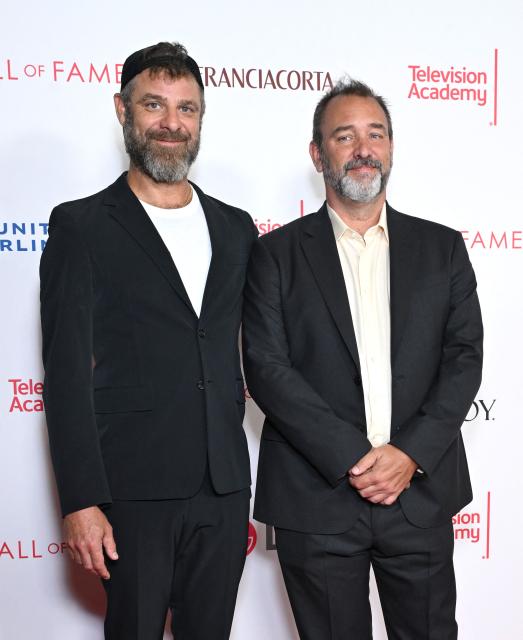 US actors and animators Matt Stone (L) and Trey Parker, creators of "South Park", attend the 28th Television Academy Hall of Fame ceremony at LA Live in Los Angeles on August 13, 2026. (Photo by LISA O'CONNOR / AFP)