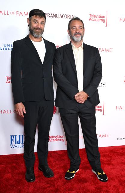 US actors and animators Matt Stone (L) and Trey Parker, creators of "South Park", attend the 28th Television Academy Hall of Fame ceremony at LA Live in Los Angeles on August 13, 2026. (Photo by LISA O'CONNOR / AFP)