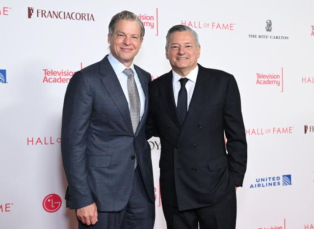 Netflix Co-CEOs Greg Peters (L) and Ted Sarandos attend the 28th Television Academy Hall of Fame ceremony at LA Live in Los Angeles on August 13, 2026. (Photo by LISA O'CONNOR / AFP)