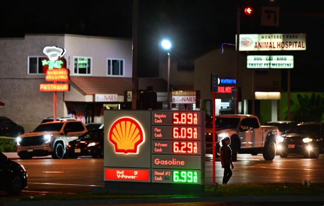 Gas prices are seen listed as motorists make their way durig the evening commute in Monterey Park, California, on August 13, 2026. The top US priority now in the Iran war is no longer its nuclear program but to bring gasoline prices down for American consumers, US Vice President JD Vance said August 13, with the US Treasury Secretary Scott Bessent adding that new economic punishment to wear down Tehran is imminent. (Photo by Frederic J. BROWN / AFP)