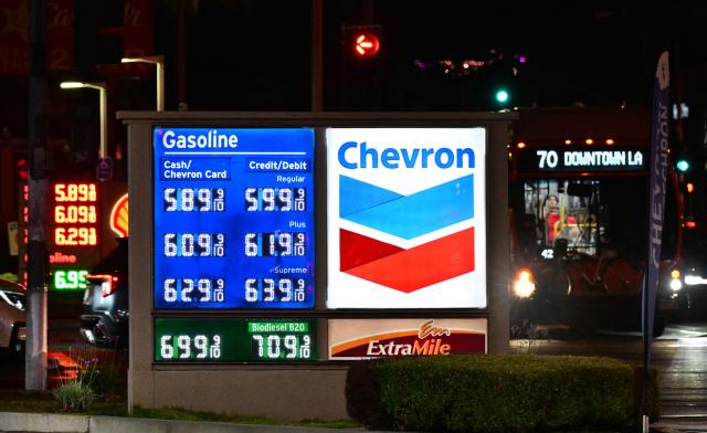 Gas prices are seen listed as motorists make their way durig the evening commute in Monterey Park, California, on August 13, 2026. The top US priority now in the Iran war is no longer its nuclear program but to bring gasoline prices down for American consumers, US Vice President JD Vance said August 13, with the US Treasury Secretary Scott Bessent adding that new economic punishment to wear down Tehran is imminent. (Photo by Frederic J. BROWN / AFP)
