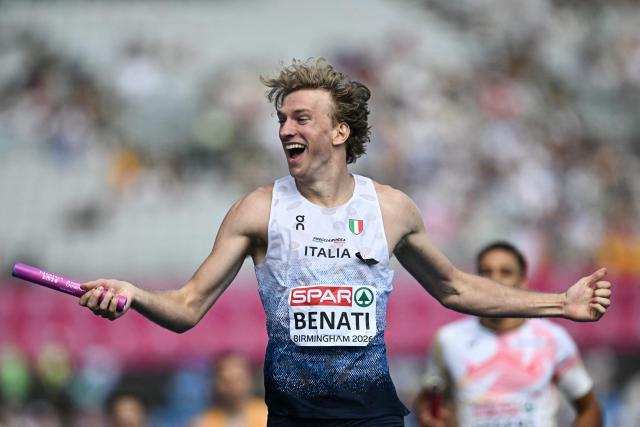 Italy's Lorenzo Benati celebrates as he crosses the finish line to arrive first in the men's 4 x 400m relay heats during the European Athletics Championships at Alexander Stadium in Birmingham on August 14, 2026. (Photo by Paul ELLIS / AFP)