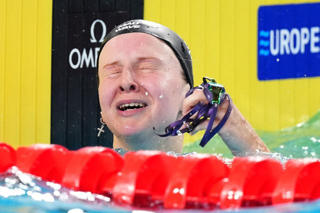 Neutral Athlete B's Evgeniia Chikunova  reacts after winning the final of the women's 200m breaststroke swimming event during the LEN European Aquatics Championships at the Olympic Aquatic Centre in Saint-Denis, northern suburbs of Paris, on August 14, 2026. (Photo by SEBASTIEN BOZON / AFP)
