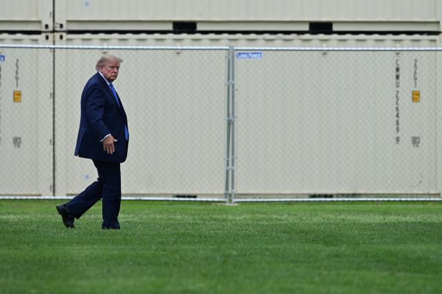 US President Donald Trump walks to board Marine One on the Ellipse near the White House in Washington, DC, on August 14, 2026. Trump is on his way to Garden City, New York to speak at the Nassau County Police Academy Center for Training and Intelligence before continuing to Bedminster, New Jersey, to spend the weekend at his golf club. (Photo by Brendan SMIALOWSKI / AFP)