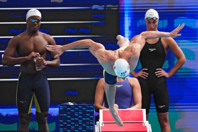 France's Maxime Grousset takes the start of the final of the mixed 4x100m freestyle relay swimming event during the LEN European Aquatics Championships at the Olympic Aquatic Centre in Saint-Denis, northern suburbs of Paris, on August 14, 2026. (Photo by Dimitar DILKOFF / AFP)