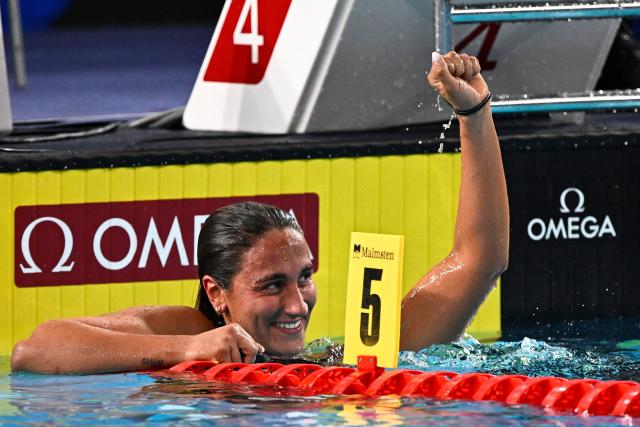 Italy's Simona Quadarella reacts after winning the final of the women's 1500m freestyle swimming event during the LEN European Aquatics Championships at the Olympic Aquatic Centre in Saint-Denis, northern suburbs of Paris, on August 14, 2026. (Photo by JULIEN DE ROSA / AFP)