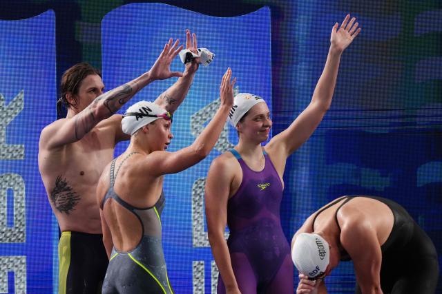 Team Neutral athlete B celebrates winning the final of the mixed 4x100m freestyle relay swimming event during the LEN European Aquatics Championships at the Olympic Aquatic Centre in Saint-Denis, northern suburbs of Paris, on August 14, 2026. (Photo by Dimitar DILKOFF / AFP)