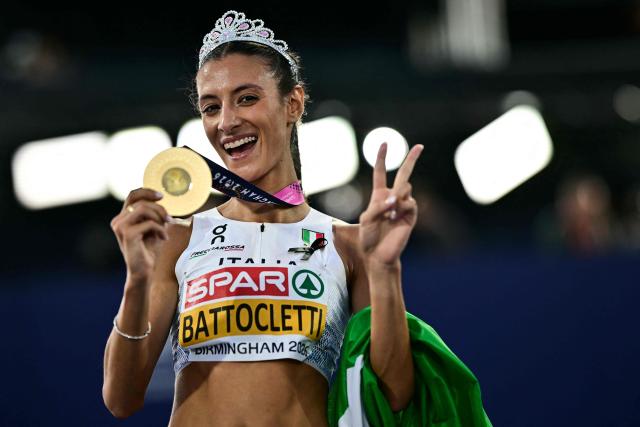 Gold medallist Italy's Nadia Battocletti celebrates after winning the women's 10,000m final during the European Athletics Championships at Alexander Stadium in Birmingham on August 14, 2026. (Photo by Ben STANSALL / AFP)