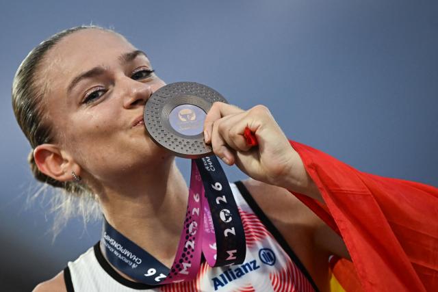 Bronze medallist Belgium's Jana van Lent celebrates after competing in the women's 10,000m final during the European Athletics Championships at Alexander Stadium in Birmingham on August 14, 2026. (Photo by Paul ELLIS / AFP)