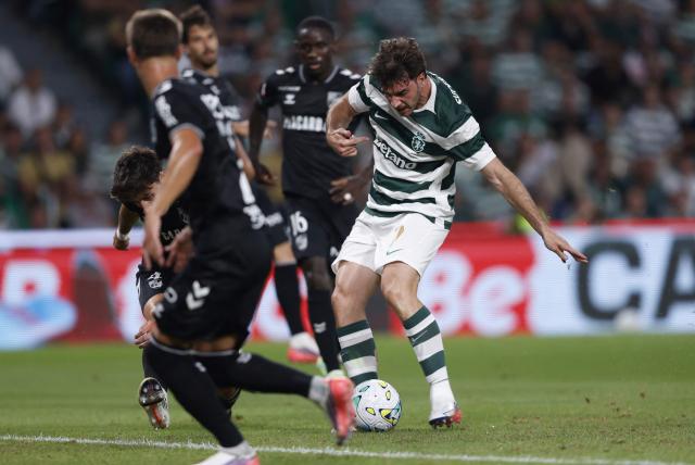 Sporting Lisbon's Greek forward #07 Fotis Ioannidis scores his team's second goal during the Portuguese League football match between Sporting CP and Vitoria Guimaraes SC at Jose Alvalade stadium in Lisbon on August 14, 2026. (Photo by FILIPE AMORIM / AFP)