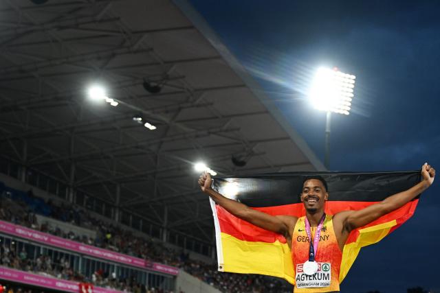 Silver medallist Germany's Emil Agyekum celebrates after competing in the men's 400m hurdles final during the European Athletics Championships at Alexander Stadium in Birmingham on August 14, 2026. (Photo by Paul ELLIS / AFP)