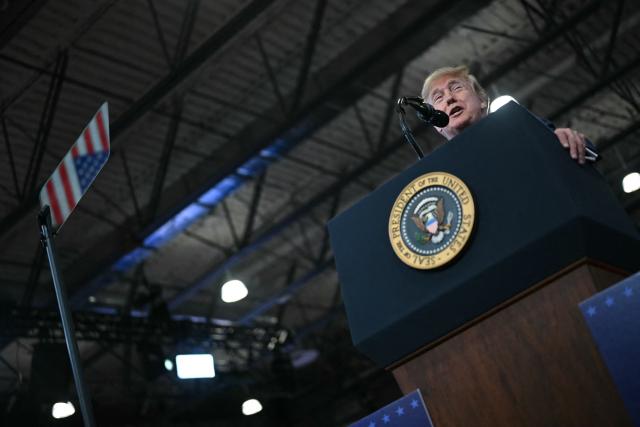 US President Donald Trump delivers remarks at the Nassau County Police Academy Center for Training and Intelligence in Garden City, New York, on August 14, 2026. (Photo by Kent NISHIMURA / AFP)