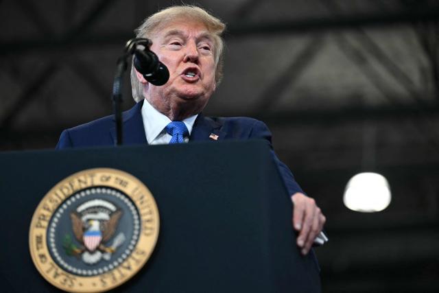 US President Donald Trump delivers remarks at the Nassau County Police Academy Center for Training and Intelligence in Garden City, New York, on August 14, 2026. (Photo by Kent NISHIMURA / AFP)