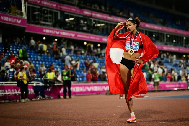 Gold medallist Switzerland's Audrey Werro reacts after winning the women's 800m final and breaking the championship record during the European Athletics Championships at Alexander Stadium in Birmingham on August 14, 2026. (Photo by Ben STANSALL / AFP)