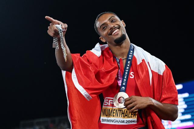 Bronze medallist Switzerland's Timothe Mumenthaler celebrates after compet in the men's 200m final during the European Athletics Championships at Alexander Stadium in Birmingham on August 14, 2026. (Photo by Paul ELLIS / AFP)