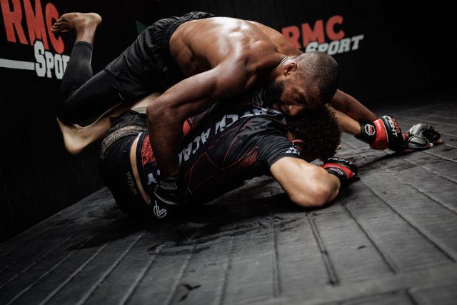 French-Moroccan mixed martial artist Salahdine Parnasse fights with a training partner during a training at the Atch Academy training centre in Aubervilliers, a northern Paris suburb on August 13, 2026. For his UFC debut, Salahdine Parnasse is making a grand entrance as the headliner at UFC Paris – a "new beginning" in his career, according to the 28-year-old Frenchman, who is aiming to become the "ultimate fighter". (Photo by SIMON WOHLFAHRT / AFP)