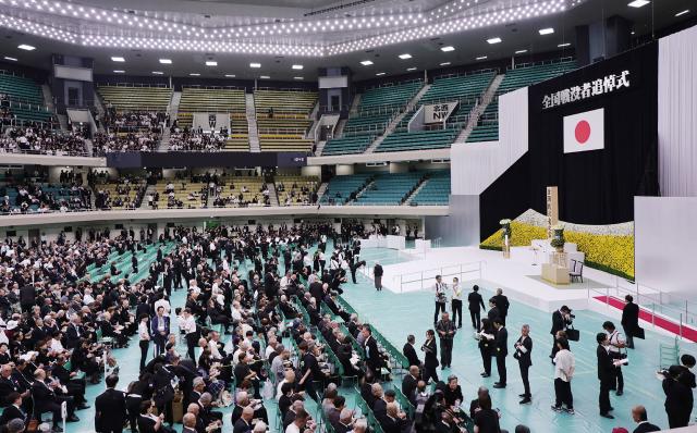 People attend the National War Memorial Ceremony at the Nippon Budokan in Tokyo on August 15, 2026, on the 81st anniversary of Japan's surrender in World War II. (Photo by JIJI Press / AFP) / Japan OUT
