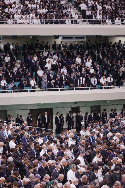 People attend the National War Memorial Ceremony at the Nippon Budokan in Tokyo on August 15, 2026, on the 81st anniversary of Japan's surrender in World War II. (Photo by JIJI Press / AFP) / Japan OUT