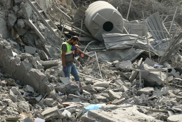 First responders searches for survivors amidst the rubble on the aftermath of an Israeli airstrike that targeted a house in the southern Lebanese village of Ansar on August 15, 2026. Lebanese state media said an Israeli strike in the country's south on August 15, killed seven people and wounded three others, the worst toll since deals in June saw a lull in hostilities between Israel and Hezbollah. Hezbollah drew Lebanon into the Middle East war in March with rocket fire at Israel in support of its backer Iran. Israel responded with heavy airstrikes and a ground invasion that Lebanese authorities say have killed more than 4,300 people. (Photo by Mahmoud ZAYYAT / AFP)