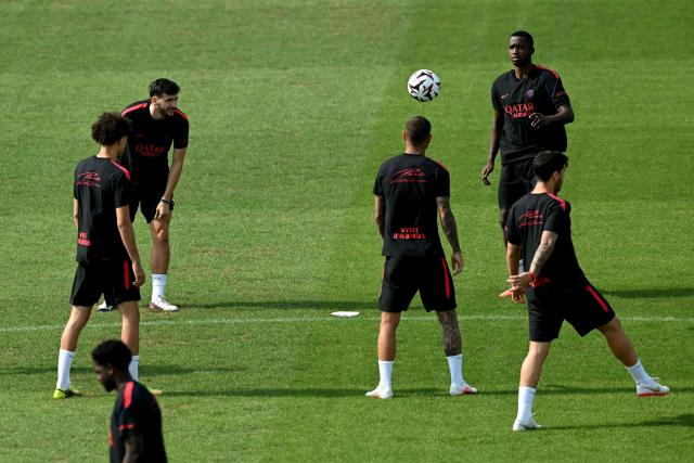 Paris Saint-Germain's players take part in a training session at the Paris Saint-Germain's campus in Poissy, west of Paris on August 15, 2026, on the eve of their French Super Cup (Trophee des Champions) football match against RC Lens. (Photo by LOU BENOIST / AFP)