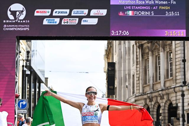 Gold medallist Italy's Sofia Fiorini celebrates winning the women's marathon race walk and breaking the world record during the European Athletics Championships in Birmingham on August 15, 2026. (Photo by Paul ELLIS / AFP)