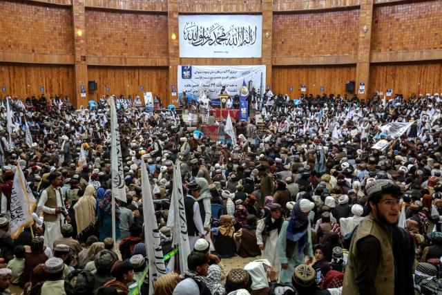 Afghans gather during a ceremony to celebrate the fifth anniversary of the Taliban government's return to power, in Ghazni province on August 15, 2026. The Taliban government celebrates five years of ruling Afghanistan on August 15, with the authorities hailing their country's "freedom" and security, while critics decry tightening restrictions in all areas of daily life. (Photo by Mohammad Faisal NAWEED / AFP)