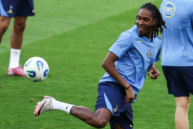 (FILES) Tottenham Hotspur's English defender #24 Djed Spence juggles with the ball during a training session at Friuli stadium, in Udine, on August 12, 2025, on the eve of the 2025 UEFA Super Cup final football match between Paris Saint-Germain (PSG) and Tottenham Hotspur FC. English defender Djed Spence has signed with Inter Milan until 2031, the reigning Italian champions announced on August 15, 2026. "The English full-back, born in 2000, joins the *Nerazzurri* from Tottenham on a permanent transfer. Spence has signed a contract with the club running until June 30, 2031," Inter stated in their announcement. According to the specialist website Transfermarkt, Inter paid 30 million for the 26-year-old right-back. (Photo by FRANCK FIFE / AFP)