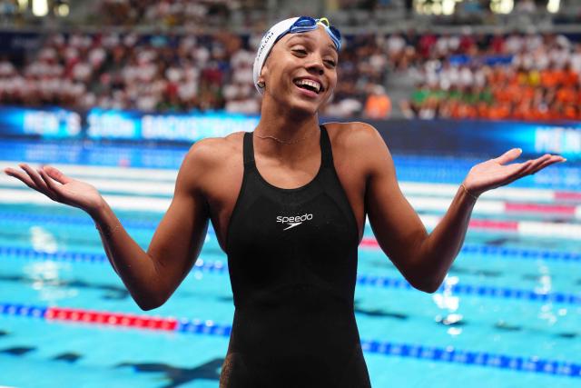 France's Mary-Ambre Moluh celebrates winning the final of the women's 100m backstroke swimming event during the LEN European Aquatics Championships at the Olympic Aquatic Centre in Saint-Denis, northern suburbs of Paris, on August 15, 2026. (Photo by Dimitar DILKOFF / AFP)