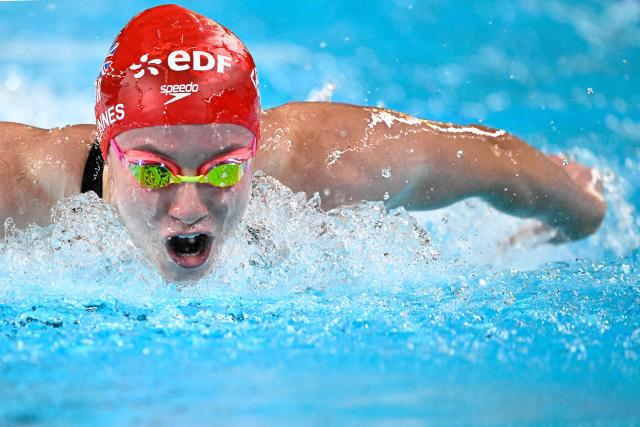 Britain's Keanna Macinnes competes in  a semi-final of the women's 200m butterfly swimming event during the LEN European Aquatics Championships at the Olympic Aquatic Centre in Saint-Denis, northern suburbs of Paris, on August 15, 2026. (Photo by JULIEN DE ROSA / AFP)