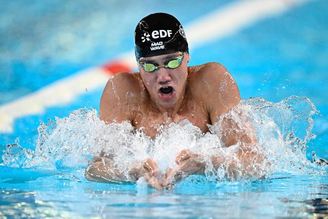 Neutral Athlete B's Mikhail Shcherbakov  competes in  a semi-final of the men's 200m individual medley swimming event during the LEN European Aquatics Championships at the Olympic Aquatic Centre in Saint-Denis, northern suburbs of Paris, on August 15, 2026. (Photo by JULIEN DE ROSA / AFP)