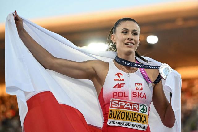 Silver medallist Poland's Natalia Bukowiecka celebrates after competing in the women's 400m final during the European Athletics Championships at Alexander Stadium in Birmingham on August 15, 2026. (Photo by Paul ELLIS / AFP)