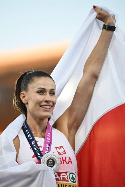Silver medallist Poland's Natalia Bukowiecka celebrates after competing in the women's 400m final during the European Athletics Championships at Alexander Stadium in Birmingham on August 15, 2026. (Photo by Paul ELLIS / AFP)