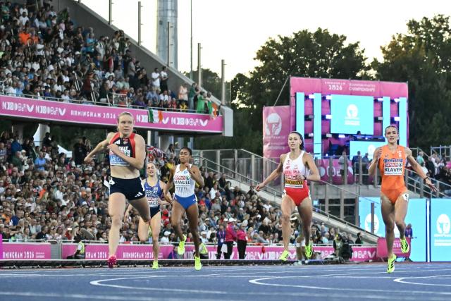 Norway's Henriette Jaeger (front R) crosses the finish line, past (back row from L) Britain's Charlotte Henrich, Czech Republic's Lurdes Gloria Manuel, Poland's Natalia Bukowiecka and Netherlands' Lieke Klaver, to win the women's 400m final during the European Athletics Championships at Alexander Stadium in Birmingham on August 15, 2026. (Photo by Paul ELLIS / AFP)