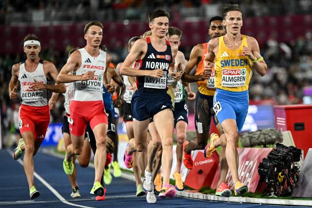 Sweden's Andreas Almgren (R) competes in the men's 10,000m final during the European Athletics Championships at Alexander Stadium in Birmingham on August 15, 2026. (Photo by Paul ELLIS / AFP)