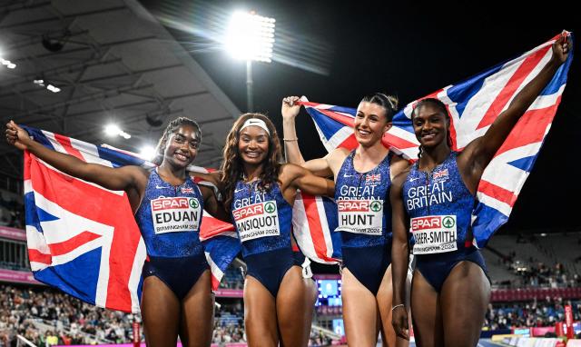 (From L) Gold medallists Britain's Success Eduan, Britain's Imani Lansiquot, Britain's Amy Hunt and Britain's Dina Asher-Smith celebrate after competing in the women's 4 x 100m relay final during the European Athletics Championships at Alexander Stadium in Birmingham on August 15, 2026. (Photo by Paul ELLIS / AFP)