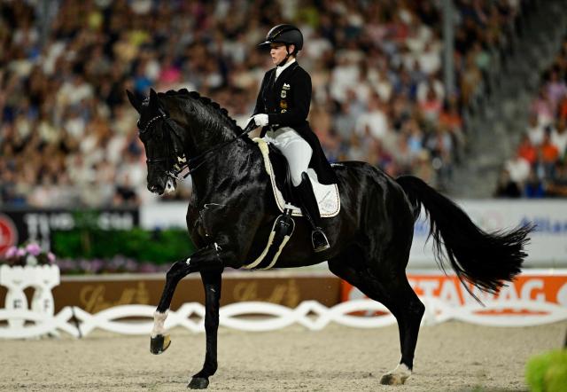 Germany's Isabell Werth competes on the horse Wendy de Fontaine in the Grand Prix Freestyle Individual Final of the FEI Dressage World Championship equestrian event on August 15, 2026 in Aachen, western Germany. (Photo by Ina FASSBENDER / AFP)