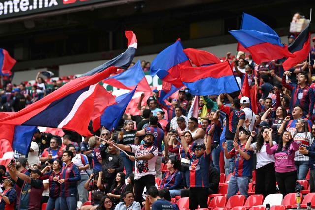 Atlante fans cheer ahead of the Liga MX Apertura tournament football match between Atlante and Toluca at Banorte stadium in Mexico City on August 15, 2026. (Photo by CARL DE SOUZA / AFP)