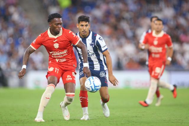 Juarez's Panamanian midfielder #11 Jose Rodriguez and Monterrey's defender #02 Ricardo Chavez fight for the ball during the Liga MX Apertura tournament football match between Monterrey and Juarez at BBVA stadium in Guadalupe, Nuevo Leon, Mexico on August 15, 2026. (Photo by Julio Cesar AGUILAR / AFP)