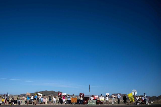 People protest the plans by US President Donald Trump's administration to build a section of the border wall at the Big Bend National Park in Study Butte, Texas, on August 15, 2026. (Photo by RONALDO SCHEMIDT / AFP)