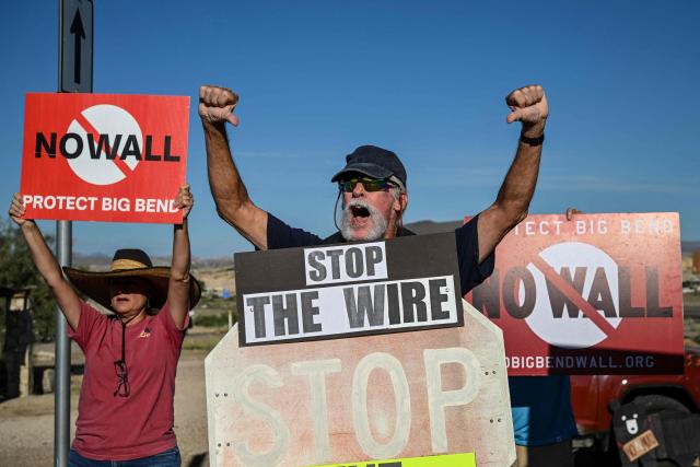 People protest the plans by US President Donald Trump's administration to build a section of the border wall at the Big Bend National Park in Study Butte, Texas, on August 15, 2026. (Photo by RONALDO SCHEMIDT / AFP)
